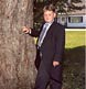 A young man in a tuxedo at his aunt's wedding