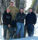 A portrait of four brothers, taken during a family sitting at their home - it was cold!