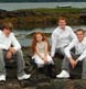 The four kids together during the family portrait on vacation in Maine.