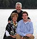 A family photographed during son's HS Senior portrait session!