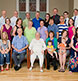 A large family gathering.  Photographed in a church in New Glouster.