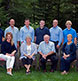 An extended family photographed in their own yard.