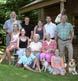 An extended family portrait at their home.