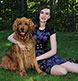 A high school senior and her dog.