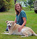 A high school senior and her dog.