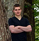 In a tree at the Harpswell studio.  High School Senior Portrait.