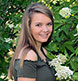 A beautiful senior portrait in a Hydrangea tree.