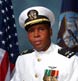 A Navy Chief Warrant Officer poses for an official portrait.