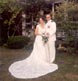 military couple with bride's beautiful train